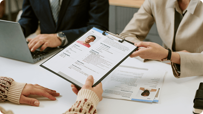 Recruiting team reviewing candidate profiles